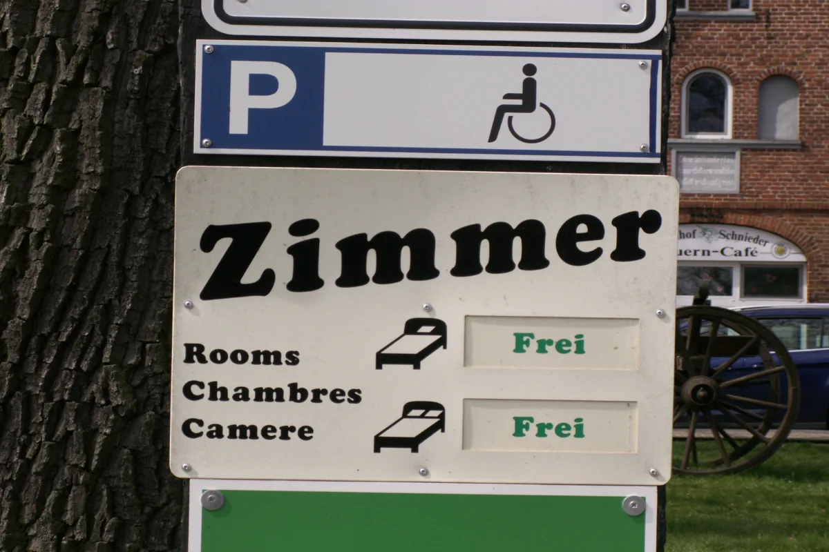Accommodation sign with wheelchair symbol
