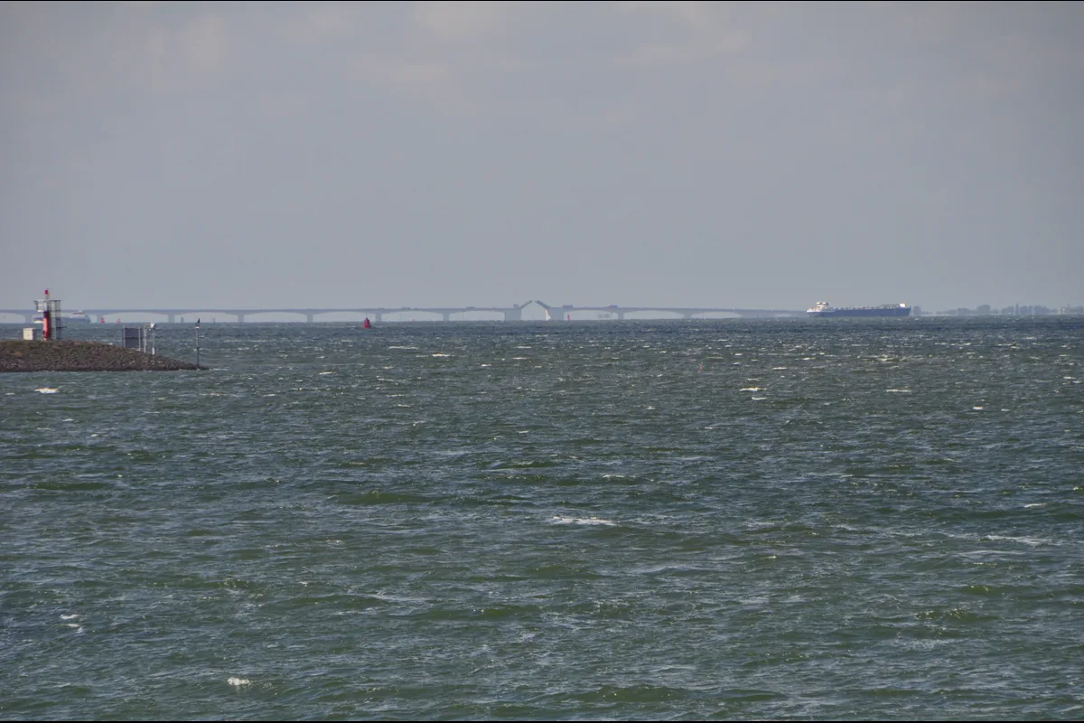Windy Oosterschelde water in Zeeland with the Zeeland Bridge in the distance